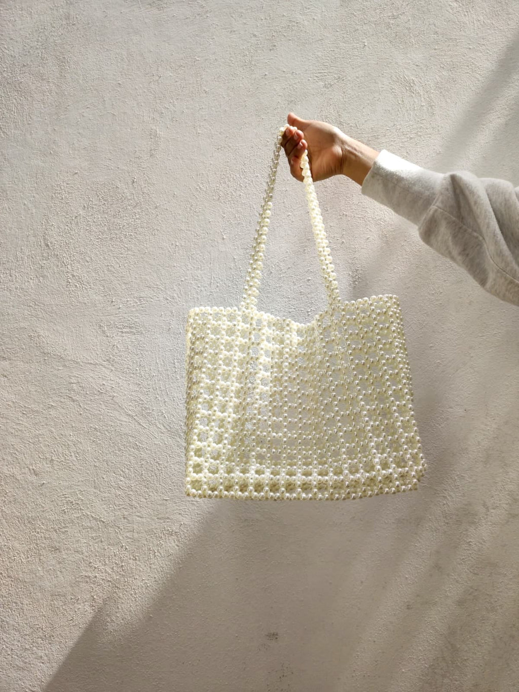 BOLSA CORAL EN PERLA