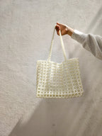 BOLSA CORAL EN PERLA