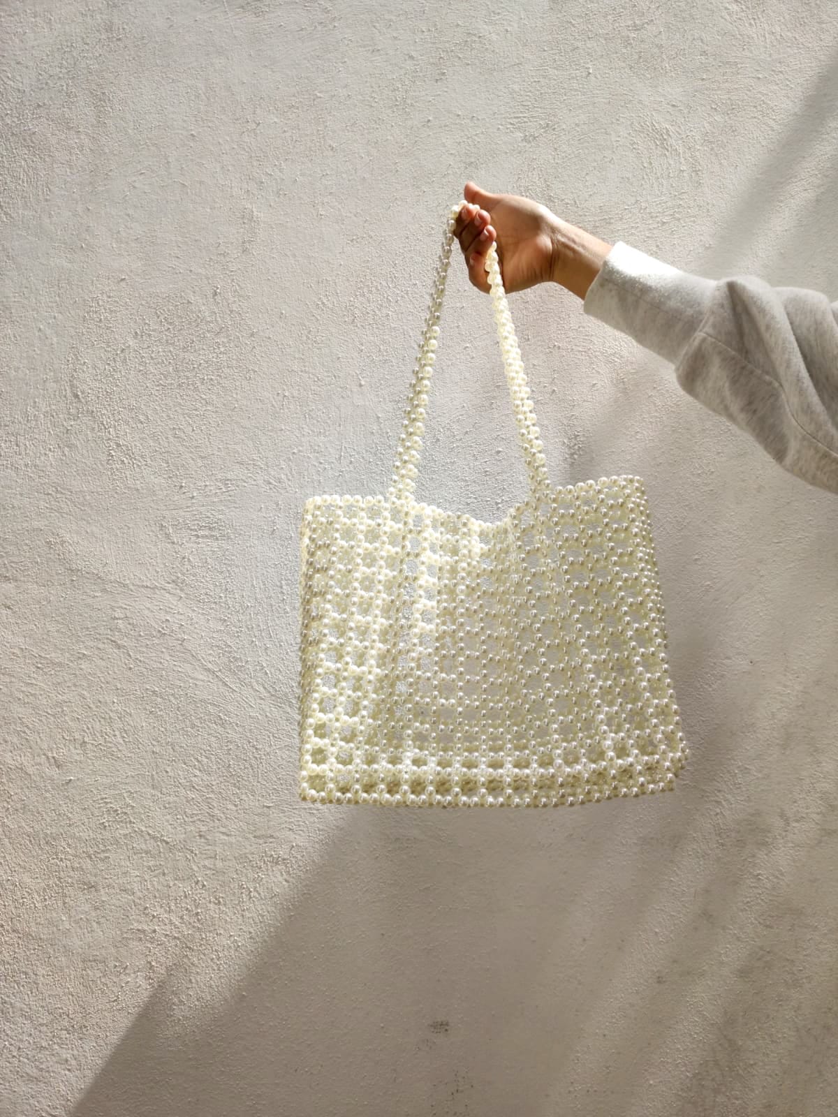 BOLSA CORAL EN PERLA